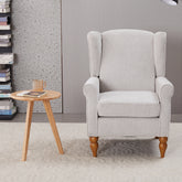Coffee Table & Armchair Set,Vintage Luxury Style, a high-back comfortable reading chair (beige) & a solid wood coffee table (Natural Wood) , suitable for living rooms and bedroom relaxation areas.