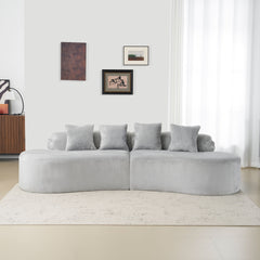 Modern and simple curved flannelette sofa. Creative multi-seater in light gray for the living room, with a combination of pillows.