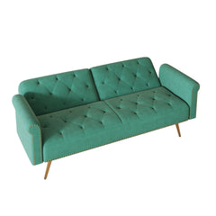 A 69.7-inch-long sofa bed covered in green velvet fabric, featuring nail head trim and accompanied by a matching throw pillow