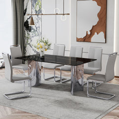 Table and chair set.The table has a glass top with imitation marble pattern stickers and stainless steel silver legs.Paired with 6 Light Gray PU Chairs with Silver C-tube Metal Leg.