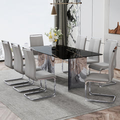Table and chair set.The table has a glass top with imitation marble pattern stickers and stainless steel silver legs.Paired with 8 Light Gray PU Chairs with Silver C-tube Metal Leg.