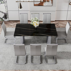 Table and chair set.The table has a glass top with imitation marble pattern stickers and stainless steel silver legs.Paired with 8 Light Gray PU Chairs with Silver C-tube Metal Leg.