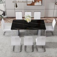 Table and chair set.The table has a glass top with imitation marble pattern stickers and stainless steel silver legs.Paired with 8 White PU Chairs with Silver C-tube Metal Leg.