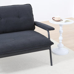The 53-inch black sofa offers a spacious layout in the small apartment, easily handling various scenarios from watching movies to working