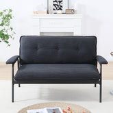 The 53-inch black sofa offers a spacious layout in the small apartment, easily handling various scenarios from watching movies to working