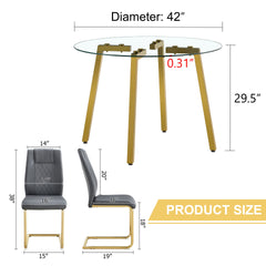 Table and chair set.A Modern Minimalist Style Round Clear Tempered Glass Table with Metal Legs.Paried with dark gray chairs with Modern PU Leather High Back Upholstered and C-Tube Golden Legs.