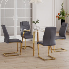 Table and chair set.A Modern Minimalist Style Round Clear Tempered Glass Table with Metal Legs.Paried with dark gray chairs with Modern PU Leather High Back Upholstered and C-Tube Golden Legs.