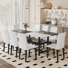 Table and chair set.71*35.4 inch White And Black Spliced Dining Table With Storage Function In The Middle Of The Table Legs.Paired With 8 White PU Dining Chairs, Simple And Versatile.