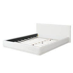 Soft and comfortable upholstered bed. Luxurious and cozy bedroom centerpiece, queen size, white