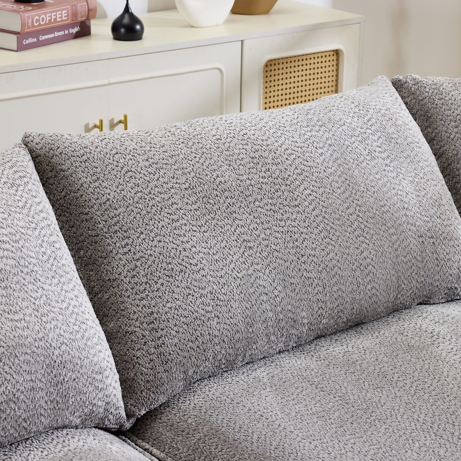 124.5-inch modern compressed boneless sofa, made of grey chenille fabric, comes with 3 back pillows and 4 throw pillows. The high-resilience sponge provides a comfortable  experience.No assembly