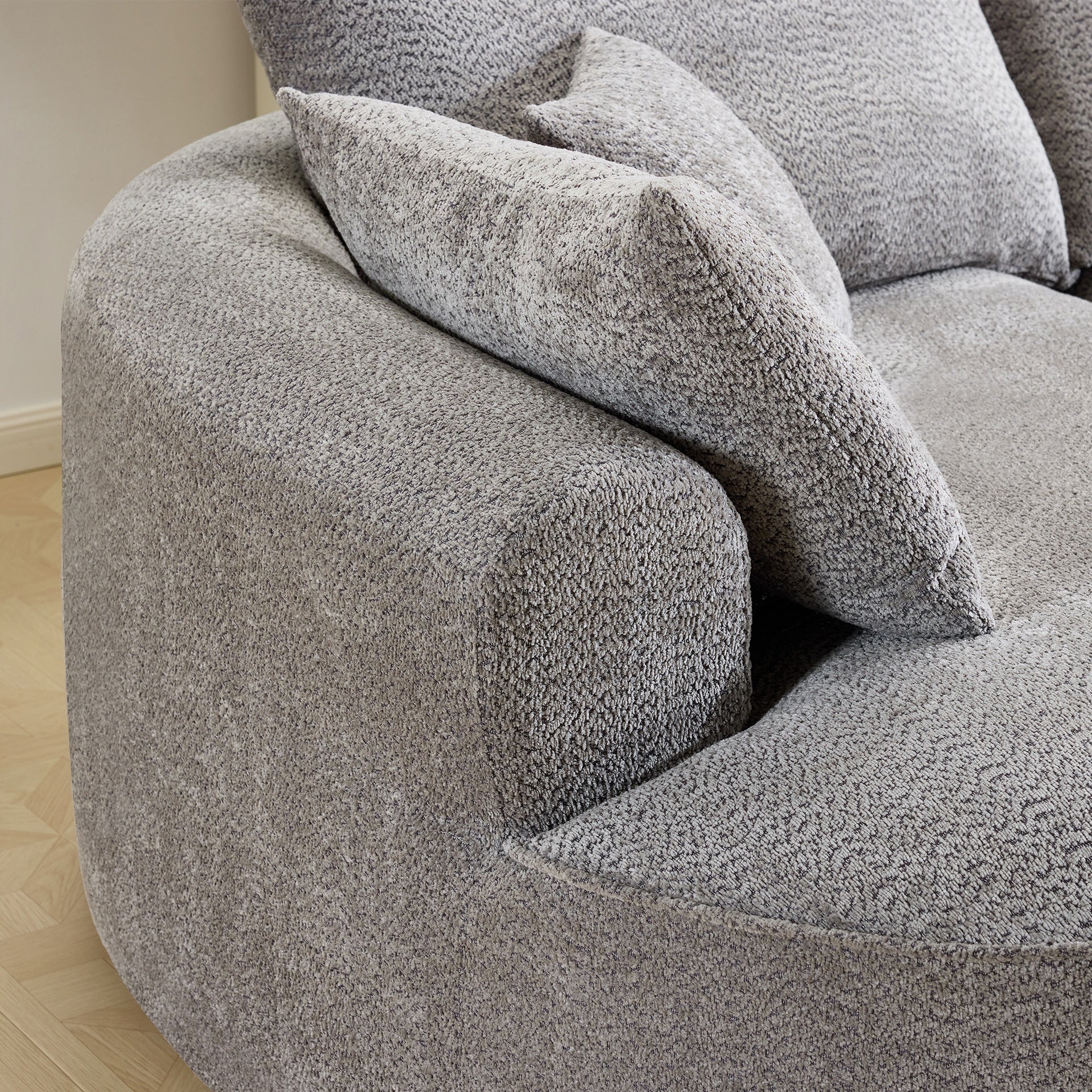 124.5-inch modern compressed boneless sofa, made of grey chenille fabric, comes with 3 back pillows and 4 throw pillows. The high-resilience sponge provides a comfortable  experience.No assembly