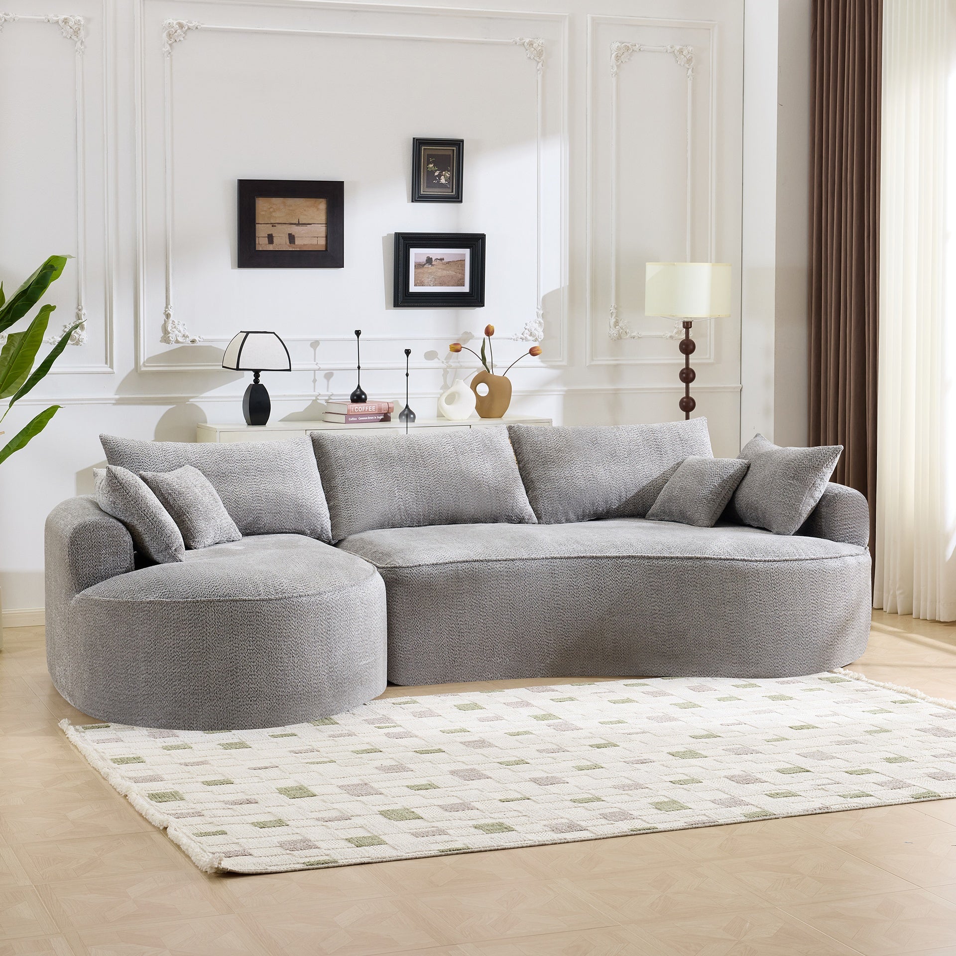 124.5-inch modern compressed boneless sofa, made of grey chenille fabric, comes with 3 back pillows and 4 throw pillows. The high-resilience sponge provides a comfortable  experience.No assembly