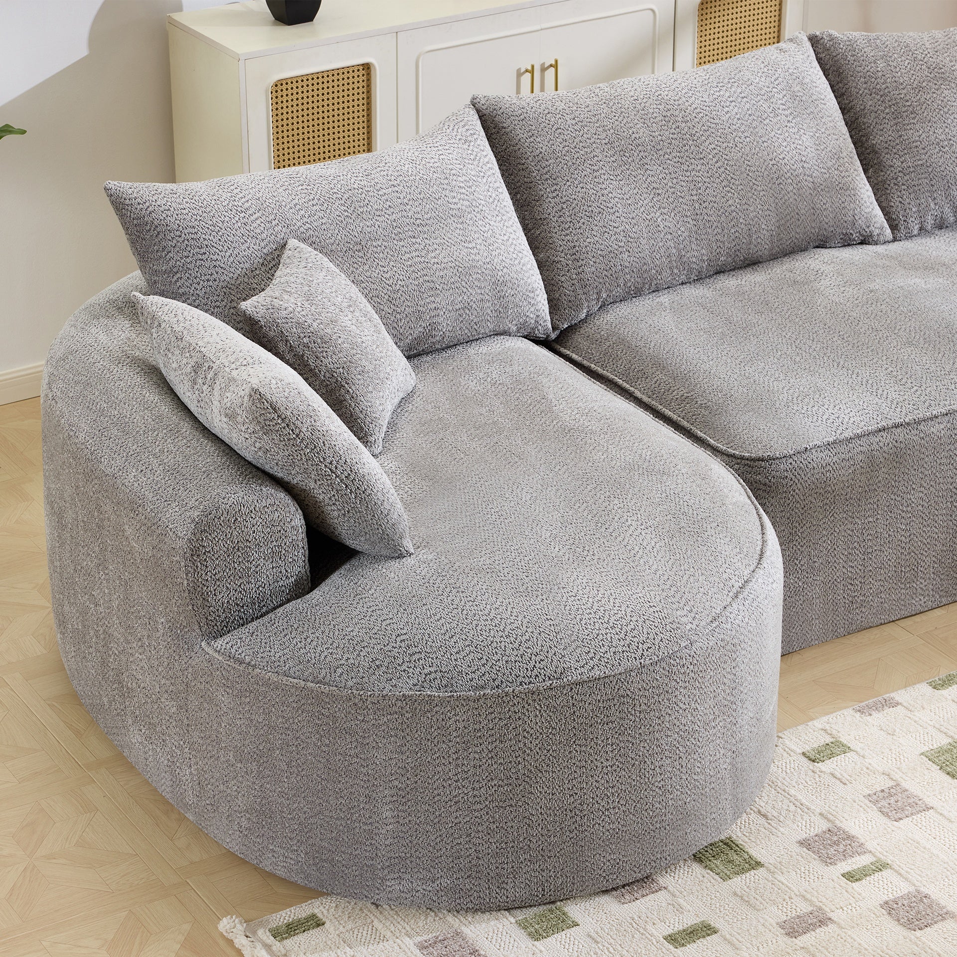 124.5-inch modern compressed boneless sofa, made of grey chenille fabric, comes with 3 back pillows and 4 throw pillows. The high-resilience sponge provides a comfortable  experience.No assembly