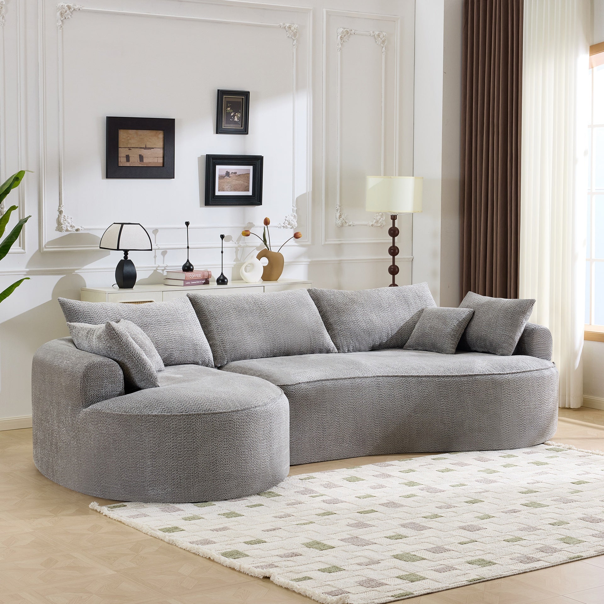 124.5-inch modern compressed boneless sofa, made of grey chenille fabric, comes with 3 back pillows and 4 throw pillows. The high-resilience sponge provides a comfortable  experience.No assembly