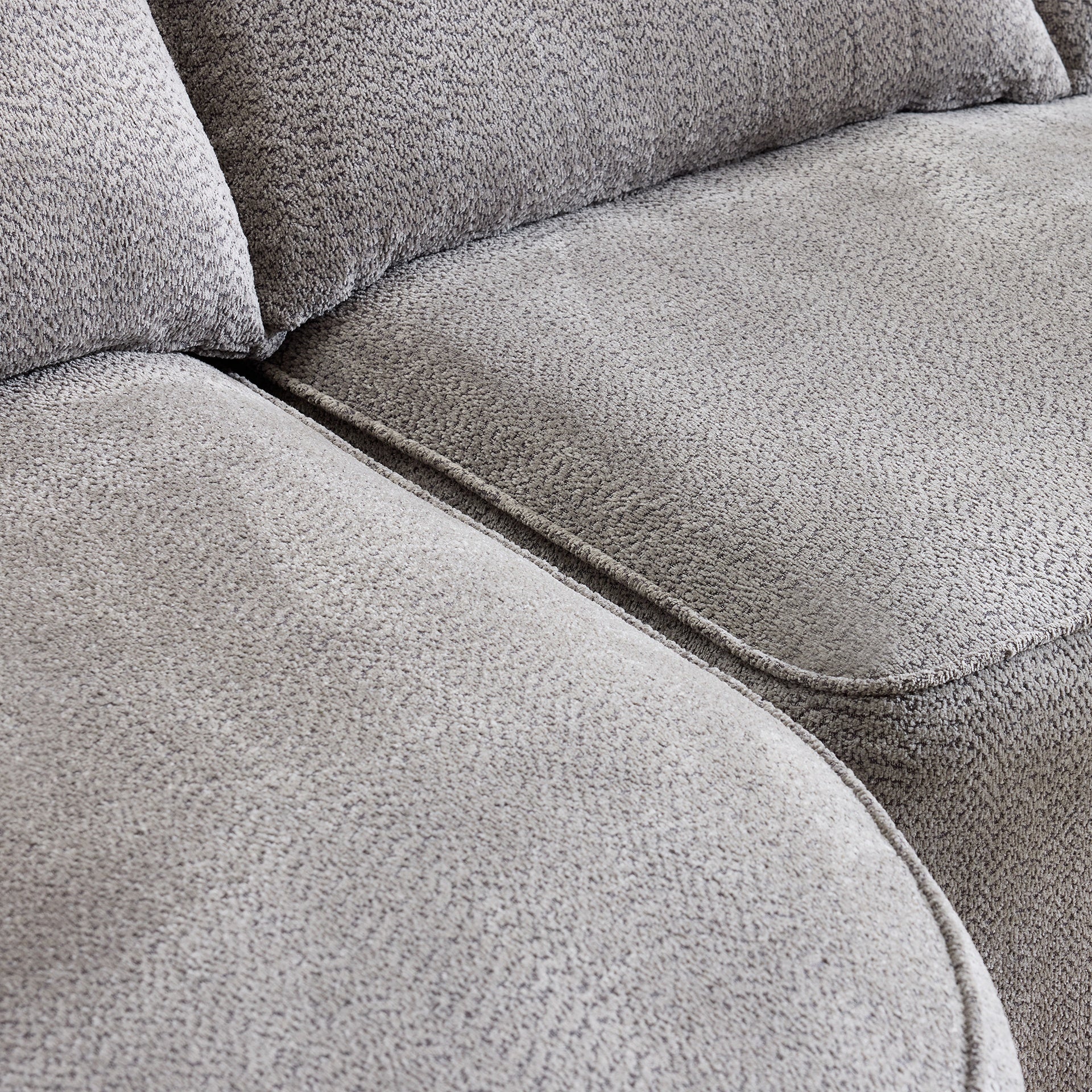 124.5-inch modern compressed boneless sofa, made of grey chenille fabric, comes with 3 back pillows and 4 throw pillows. The high-resilience sponge provides a comfortable  experience.No assembly