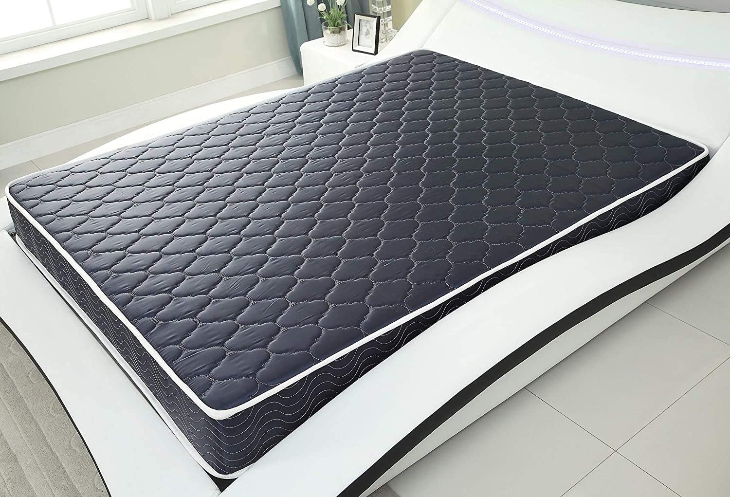 6-inch waterproof high-density foam mattress with navy blue diamond-quilted breathable fabric. Quilting ensures both style and airflow for cool sleep.Twin size.