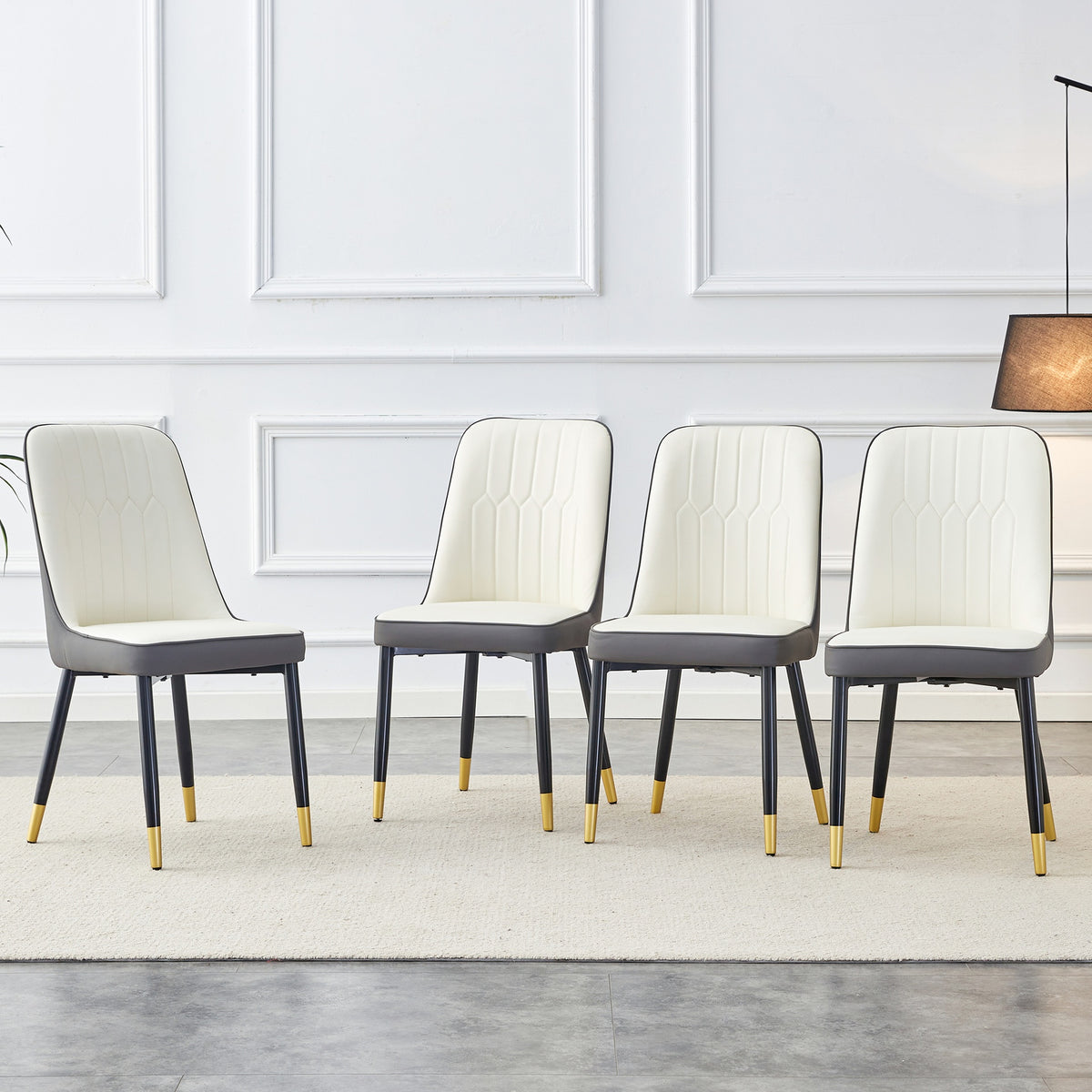 A modern dining chair with a white dark gray dual tone PU leather backrest and black metal legs, suitable for kitchens, bedrooms, and offices. A set of 4 pieces (white+dark gray+PU)C-007 W1151118960