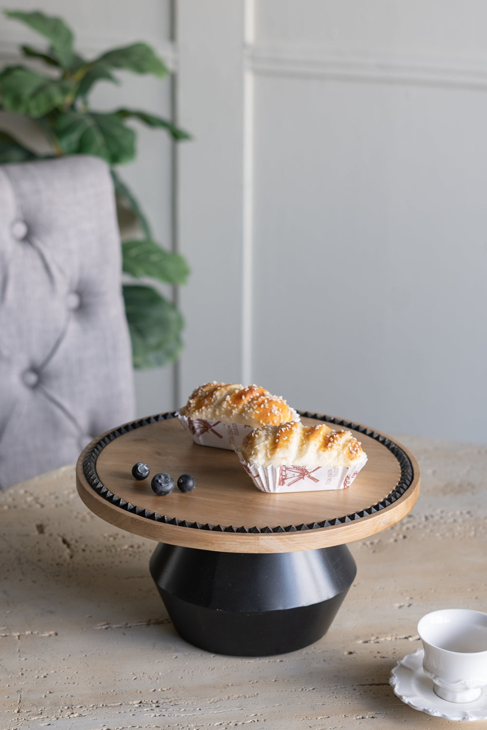 12x12x6" Round Wooden Pedestal Tray with Black Detailing and Sculptural Stand