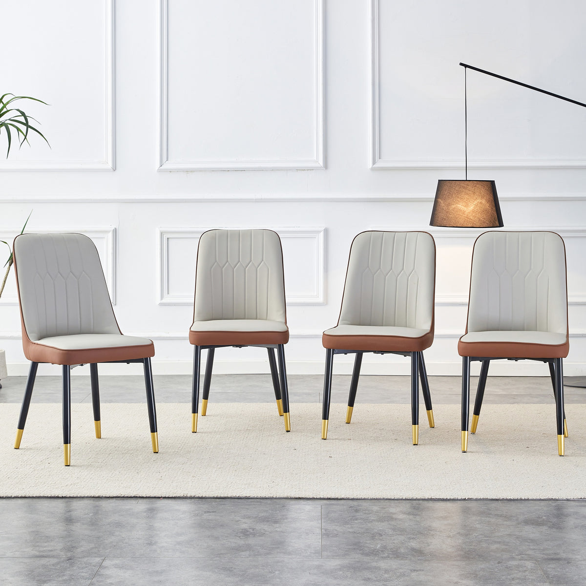 A modern dining chair with a light gray brown dual tone PU leather backrest and black metal legs, suitable for kitchens, bedrooms, and offices. Set of 4 pieces (light gray+brown+PU)C-007  W1151118958