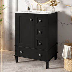 24-inch black bathroom vanity with an integrated ceramic basin, featuring a door-mounted double-layer shelf, soft-close drawers, and a soft-close cabinet door.