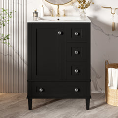 24-inch black bathroom vanity with an integrated ceramic basin, featuring a door-mounted double-layer shelf, soft-close drawers, and a soft-close cabinet door.