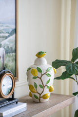8.7x8.7x15" White Ceramic Lidded Jar with Playful Lemon Design
