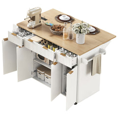 K&K Fluted Kitchen Island with Storage, 55.5" Kitchen Island with Drop Leaf, Power Outlet, 4 Doors and 3 Drawers, Rolling Island Table with Wood-grain Top, Curved Edge for Kitchen,Dining Room White