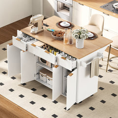 K&K Fluted Kitchen Island with Storage, 55.5" Kitchen Island with Drop Leaf, Power Outlet, 4 Doors and 3 Drawers, Rolling Island Table with Wood-grain Top, Curved Edge for Kitchen,Dining Room White