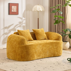 Yellow curved two - person compress  sofa. It has armrests on both sides, comes with two pillows, is suitable for small - sized apartments, and can be placed in the living room or bedroom.