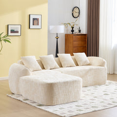 Beige chenille L-shaped compressed sofa that goes well with any living room. It features high-elastic sponge for a comfortable sitting feel,  curved armrests and four throw pillows.