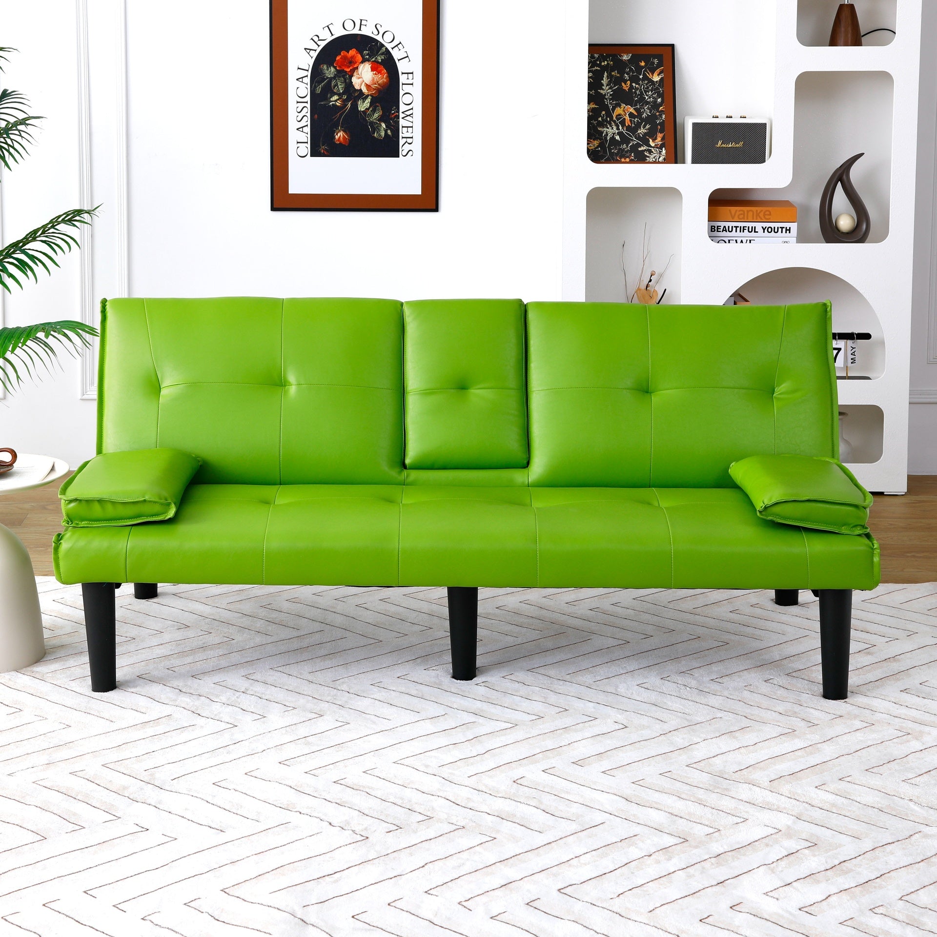 The 67-inch green PVC multi-functional sofa bed, with a foldable and cup holder design, makes it extremely convenient to turn the living room into a guest room