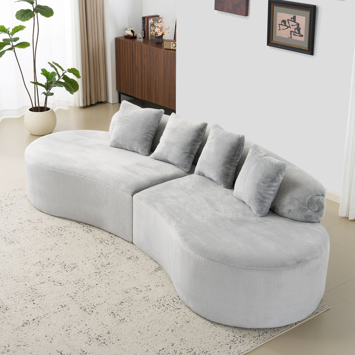 Modern and simple curved flannelette sofa. Creative multi-seater in light gray for the living room, with a combination of pillows.