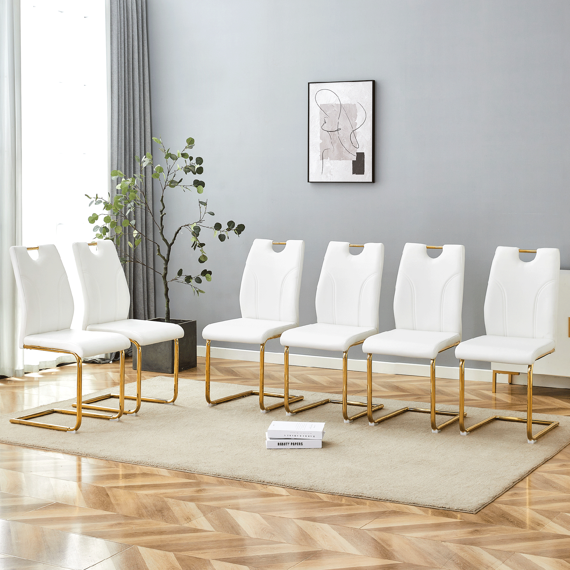White PU Dining Chair Set.Uniquely designed white dining chairs. PU material, paired with gold metal chair legs. Suitable for offices, restaurants, kitchens, conference rooms, etc.(Set of 6)