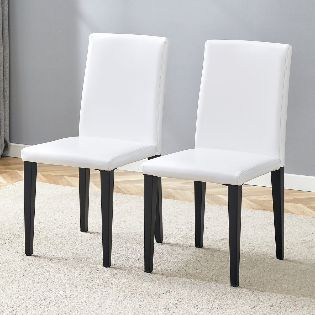 Set of 2 White PU Dining Chairs: 35.4" High, 18.5" Ergonomic Backrest, 17"×16" Sponge Seat, Perfect for Dining Room, Home Office & Living Space, Stylish & Comfortable.Black Metal Leg.