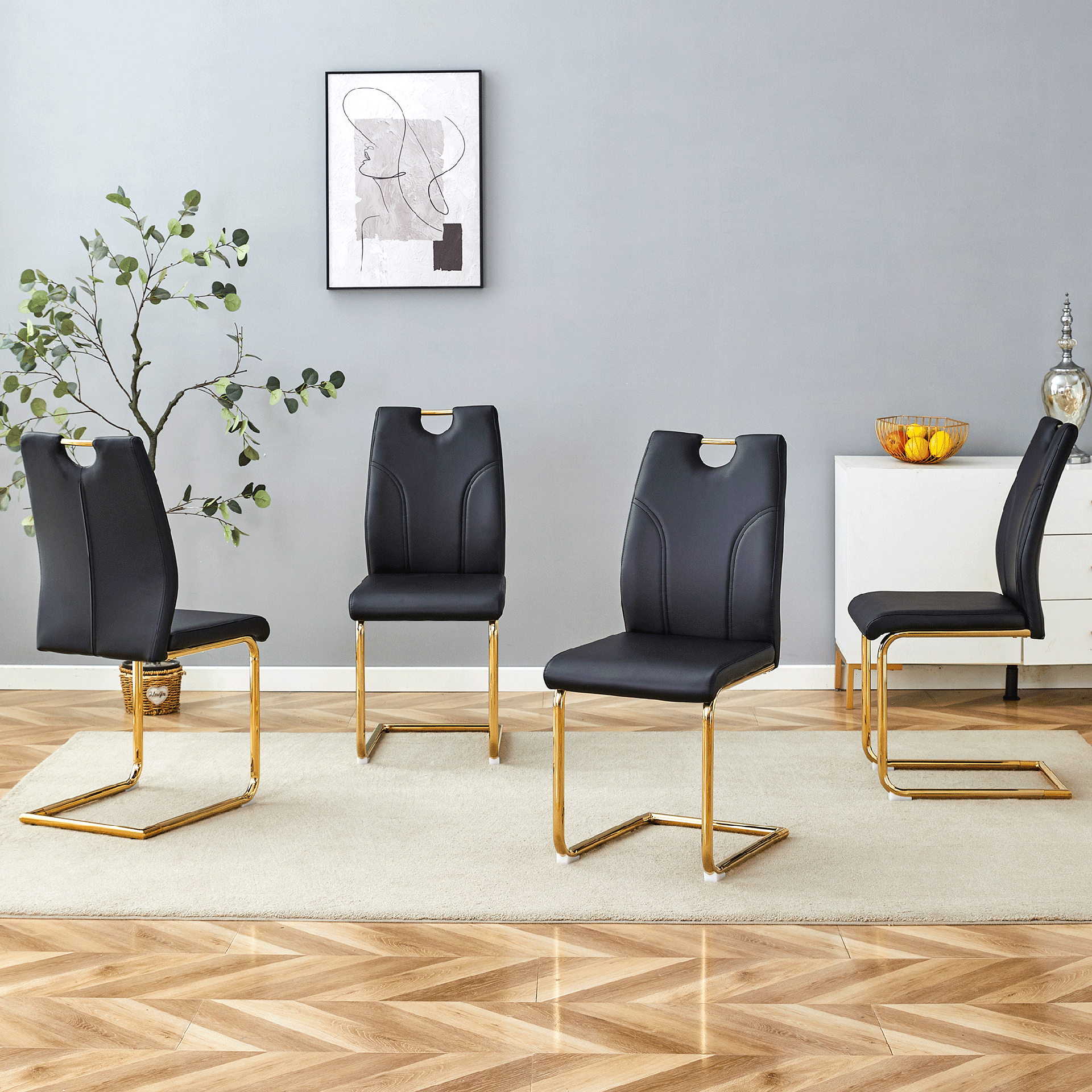 Black PU Dining Chair Set.Uniquely designed black dining chairs. PU material, paired with gold metal chair legs. Suitable for offices, restaurants, kitchens, conference rooms, etc.(Set of 4)