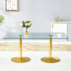 A glass tabletop with 71*35.4 inches and a modern minimalist circular dining table with electroplated gold metal legs. Suitable for restaurants, living rooms.