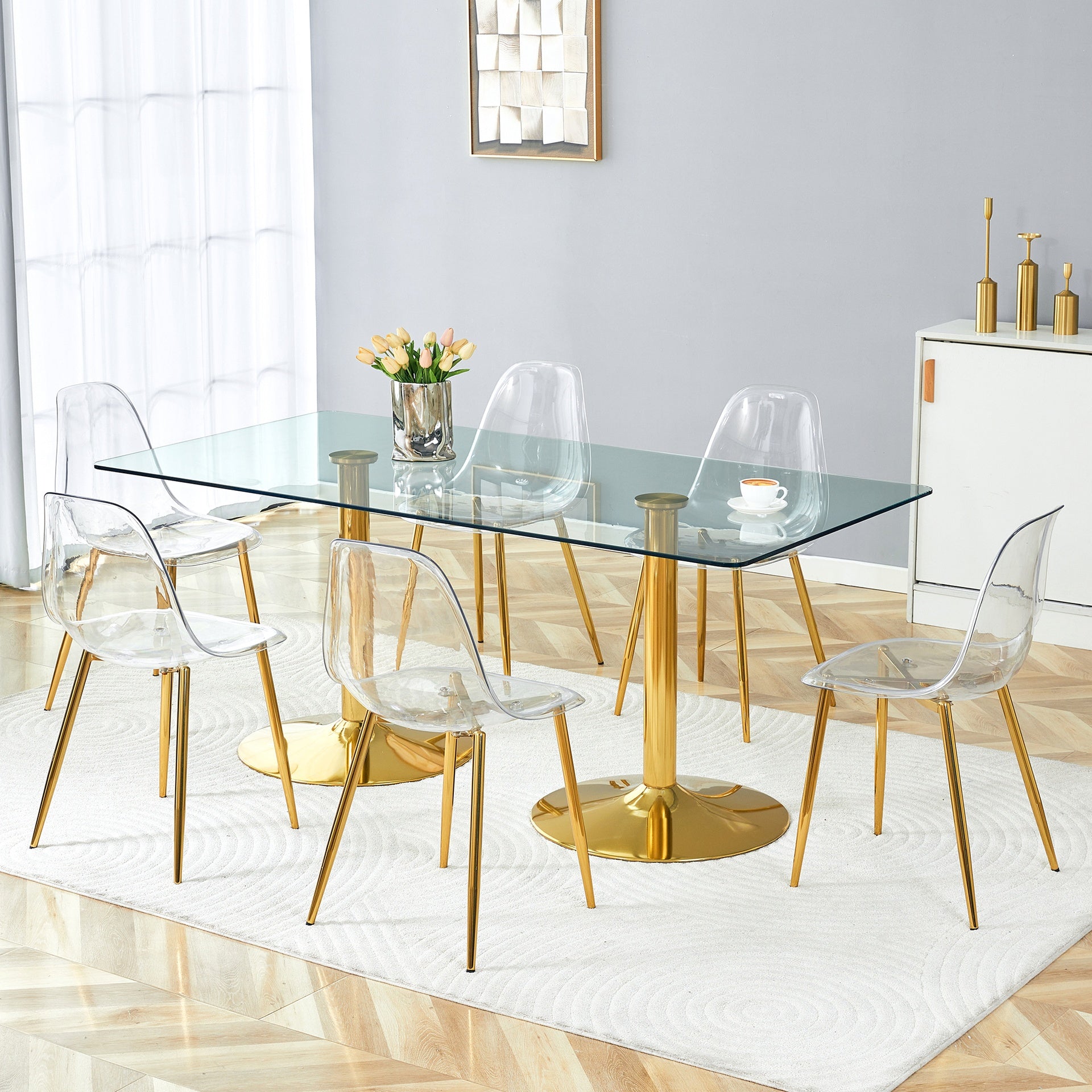 Table and chair set.71 inch x 35.4-inch tempered glass table,Paired with 6 Transparent Plastic Chairs with Golden Metal Legs.Bring a comfortable home experience.