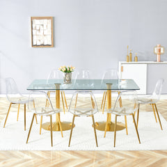 Table and chair set.71 inch x 35.4-inch tempered glass table,Paired with 8 Transparent Plastic Chairs with Golden Metal Legs.Bring a comfortable home experience.