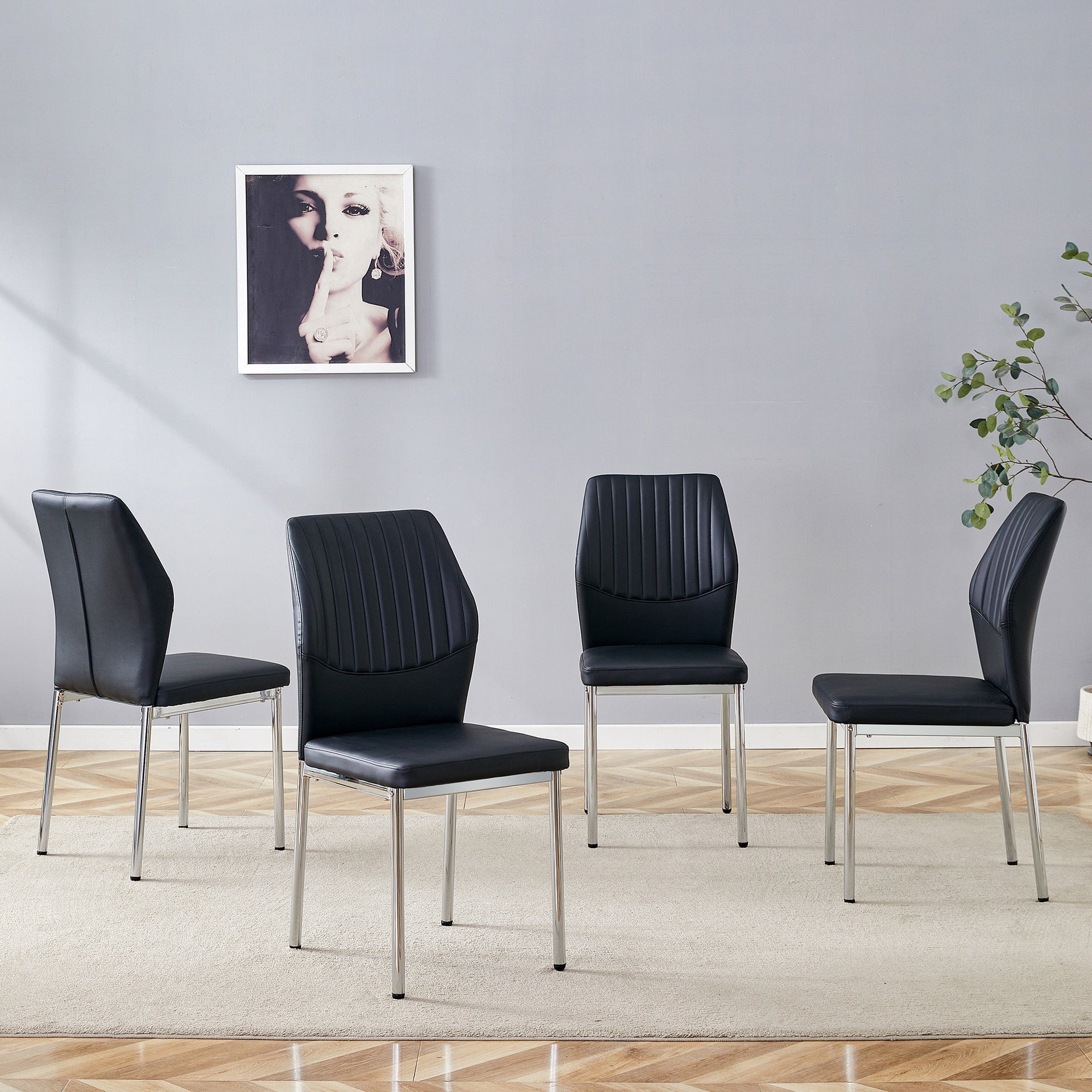 4-piece set of black silver light luxury PU dining chairs: ergonomic backrest, 36.7 inches high, suitable for multiple scenarios.Set of 4 BLACK PU Material High Resilience Dining Chairs.