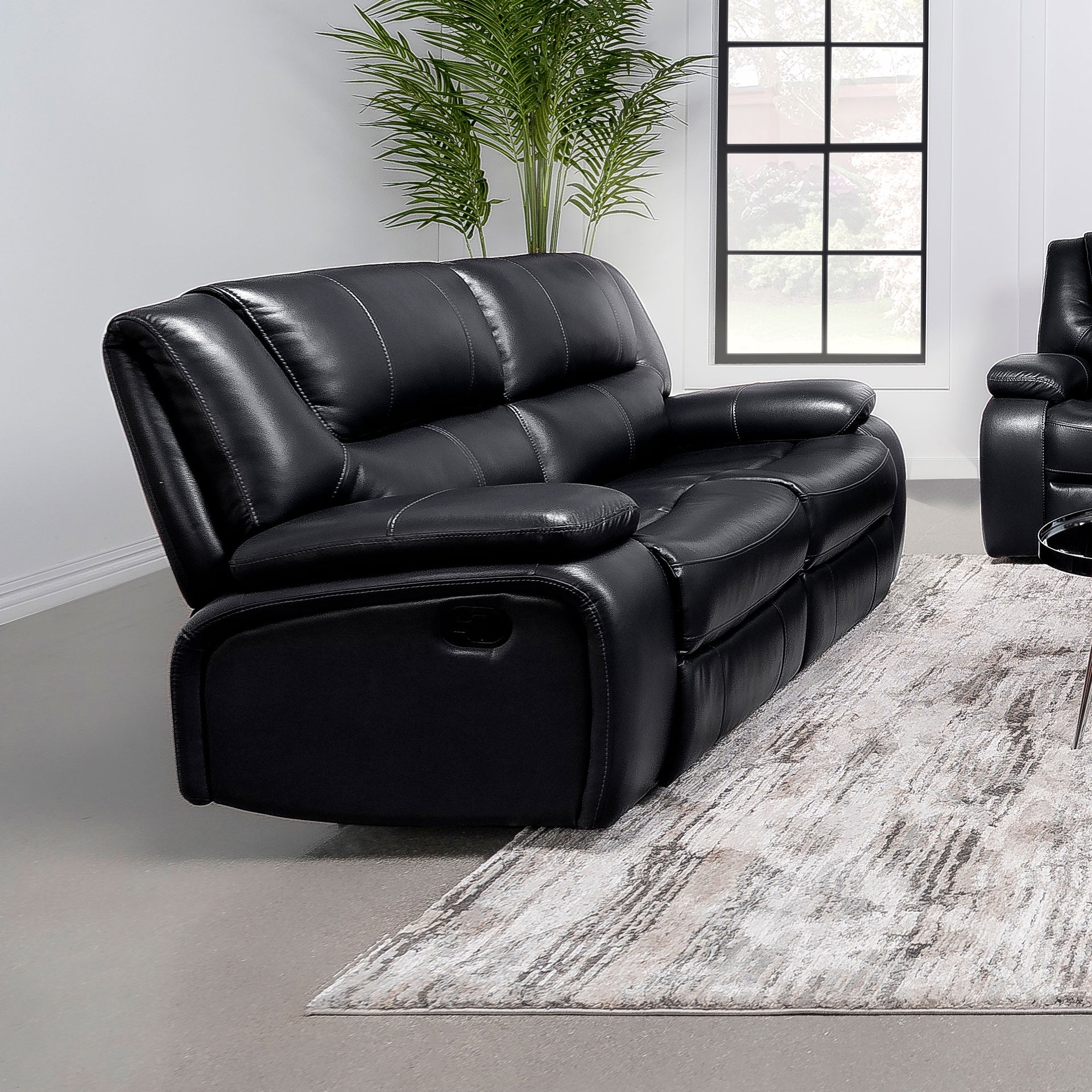 Elodie Black Upholstered Motion Reclining Loveseat