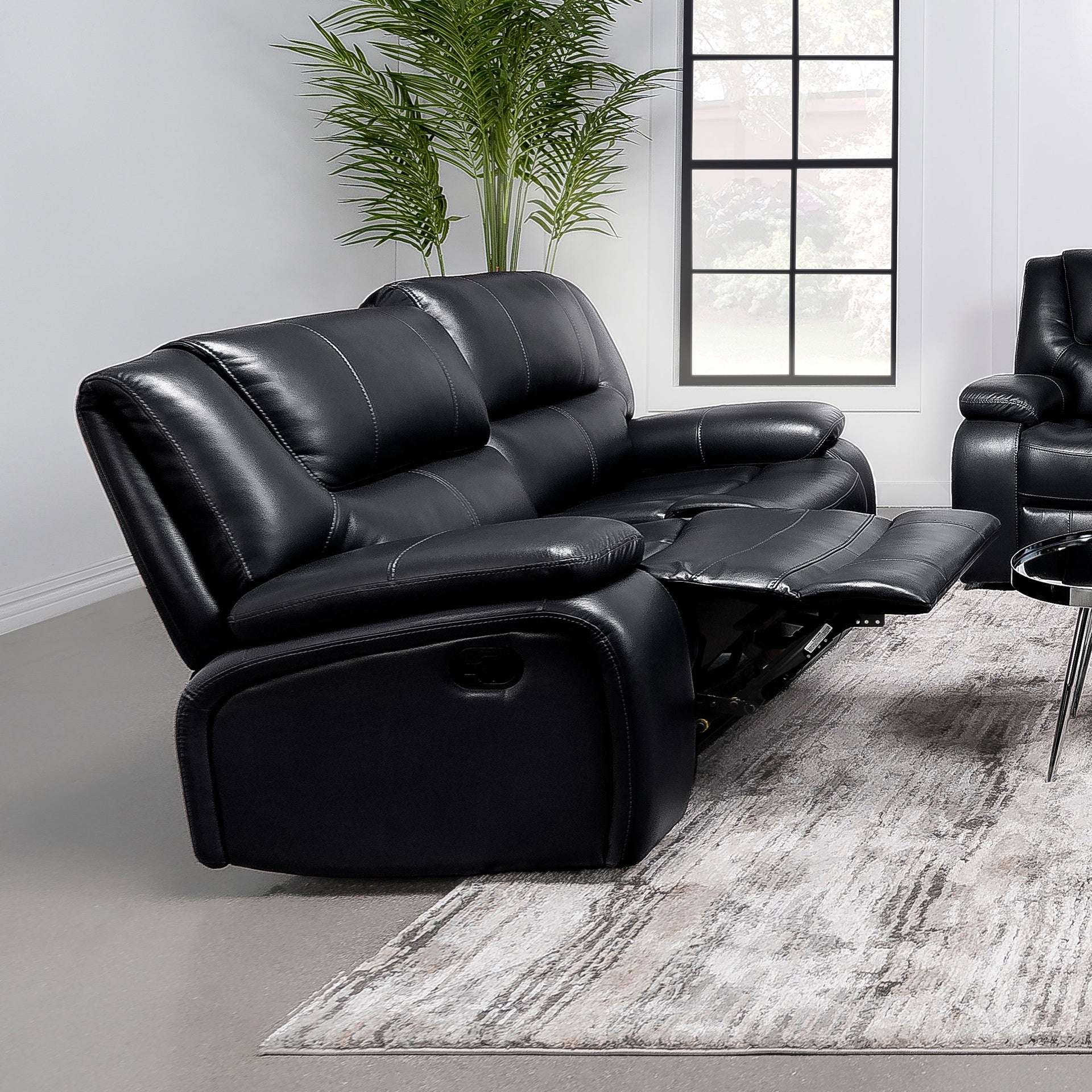 Elodie Black Upholstered Motion Reclining Loveseat