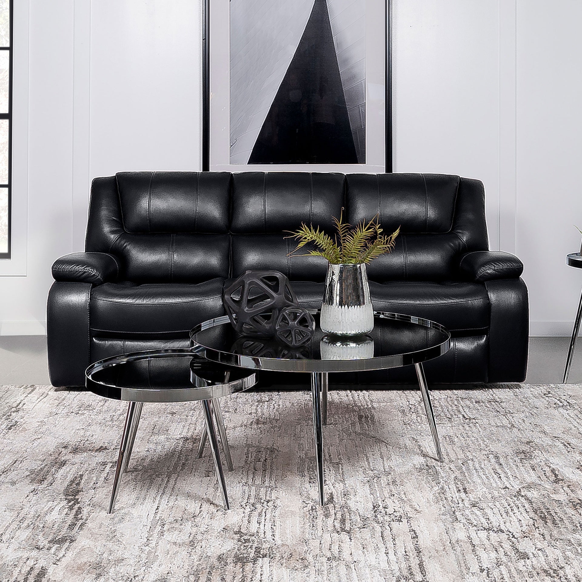 Elodie Black Upholstered Motion Reclining Sofa