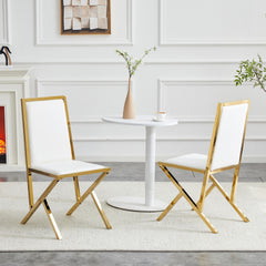 2-pack gold metal framed white PU dining chairs: ergonomic design, a simple and luxurious choice.Featuring uniquely designed gold metal legs.