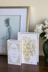 Set of 2 Decorative Book Boxes with White and Gold Floral Motifs and Text,  L: 7x3x10.5" S: 5x2x8.3"