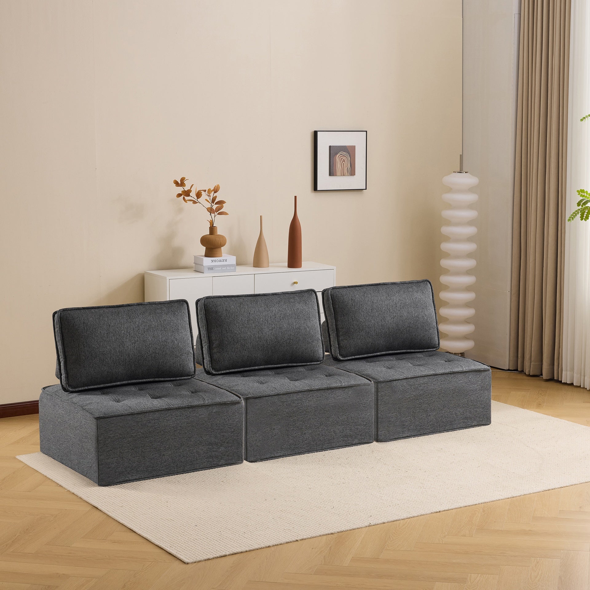 The dark gray linen wooden frame sofa can be freely spliced, meeting various needs such as in small apartment living rooms and adapting to various decoration styles."