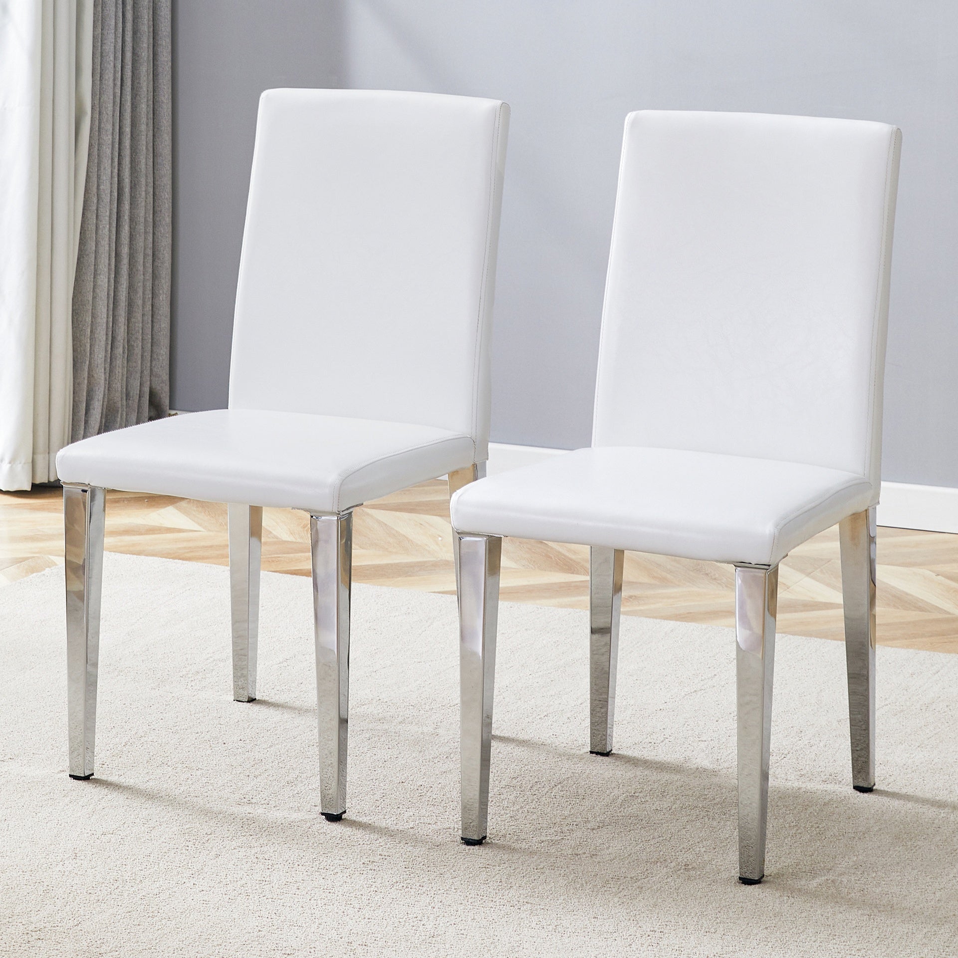 Two White PU dining chairs,Silver Metal Legs.Simple and versatile, comfortable and accompanied. Exquisite and versatile dining chairs unlock a comfortable new experience.(Set of 2)W1151P269051