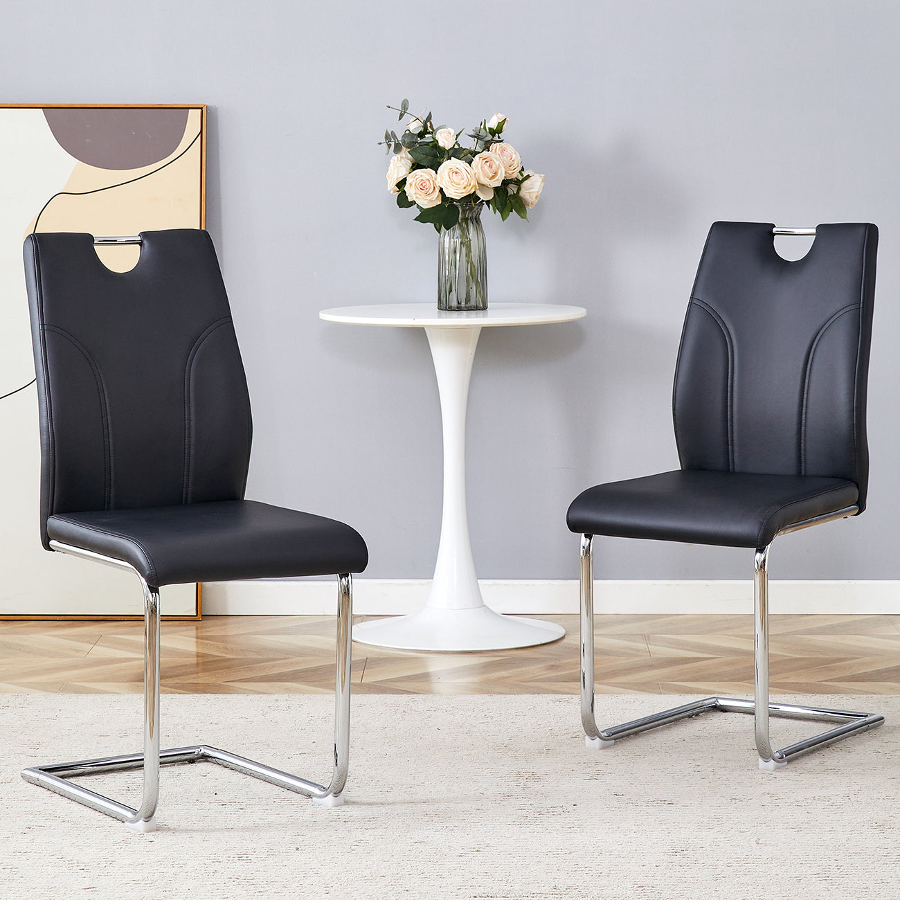 Black PU Dining Chair Set.Uniquely designed black dining chairs. PU material, paired with silver metal chair legs. Suitable for offices, restaurants, kitchens, conference rooms, etc.(Set of 2)