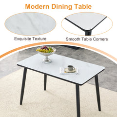 Modern minimalist rectangular dining table, suitable for 4-6 people. Tempered glass countertop+lower MDF board, imitation marble texture, black metal tapered legs. Suitable for minimalist restaurants.