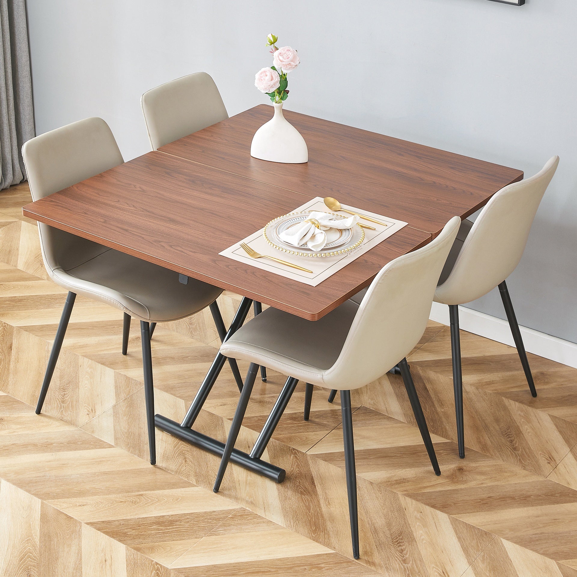 Table and chair set.Modern Multifunctional Lifting Platform,Walnut Wood Grain Sticker MDF Desktop, Black Metal Legs.Paired with 4 Warm Gray Artificial PU Chairs With Curved Widened Cushion Design.