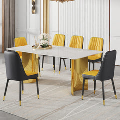 Table and chair set.The table has a glass top with imitation marble pattern stickers and stainless steel golden legs. Paried with 6 Orange and Dark Gray Spliced Color PU Dining Chairs.